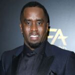 Security guard says Diddy gave him a brown paper bag stuffed with $100,000 in exchange for footage of him beating his girlfriend in a hotel hallway