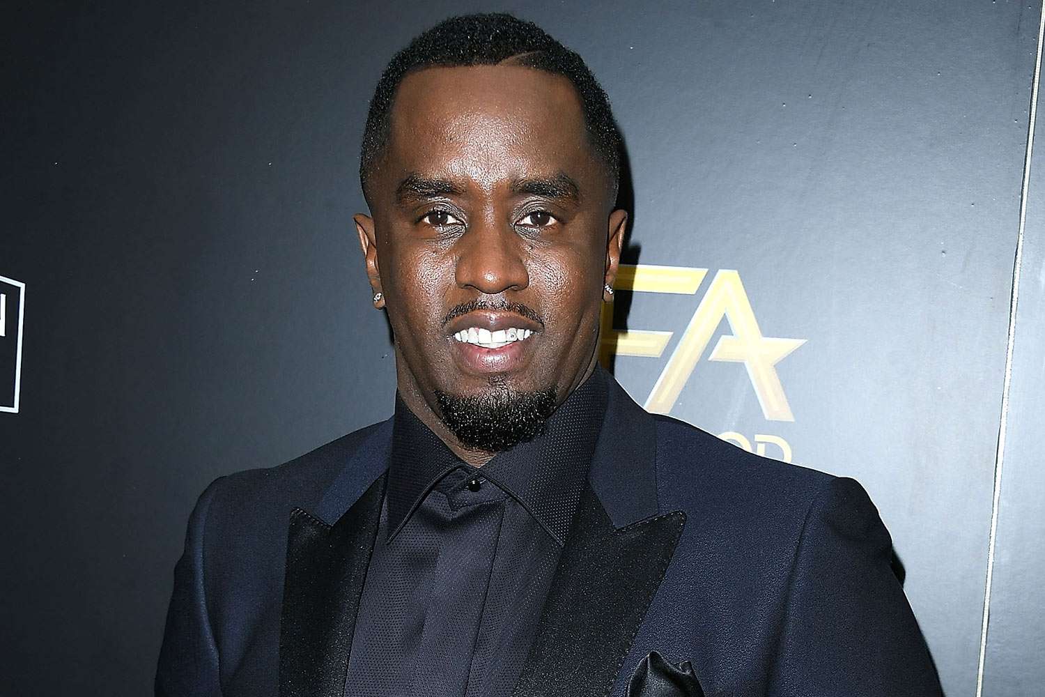 Security guard says Diddy gave him a brown paper bag stuffed with $100,000 in exchange for footage of him beating his girlfriend in a hotel hallway